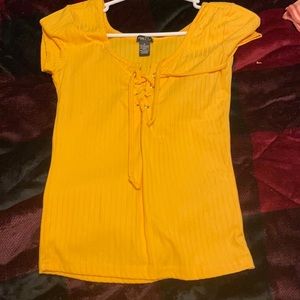 Yellow skin tight shirt